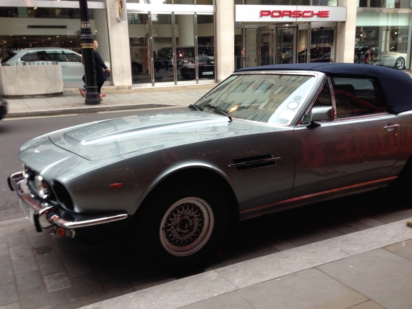 Aston V8 Volante waiting for its owner to have his weekly haircut in Mayfair