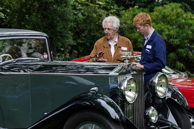 Peter was always very generous with his time. Here, he explains the intrinsic elegance of his own 1933 Rolls-Royce Phantom II Continental to a young enthusiast (Graham Glen)