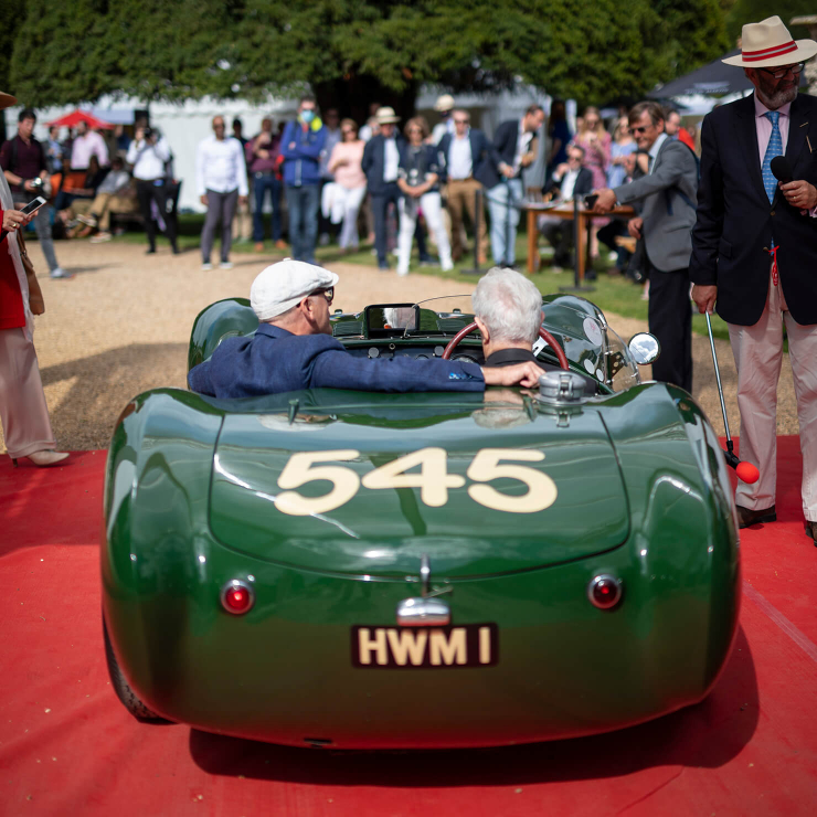 Concours of Elegance, September 2020. Peter prepares to drop the clutch on the ferocious HWM Jaguar. The red carpet did not survive the experience (Riiko Nuud)