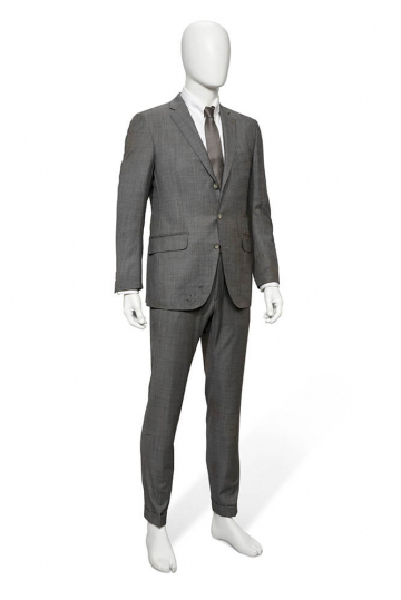 Tom Ford suit worn by Daniel Craig from the motorbike and train chase sequence in Skyfall. Est. £10k - 15k